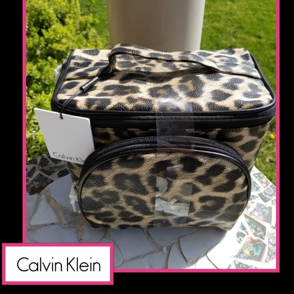 Calvin Klein Handbags - Sexy Cheetah 🐆 Travel Carrier + Makeup Case
